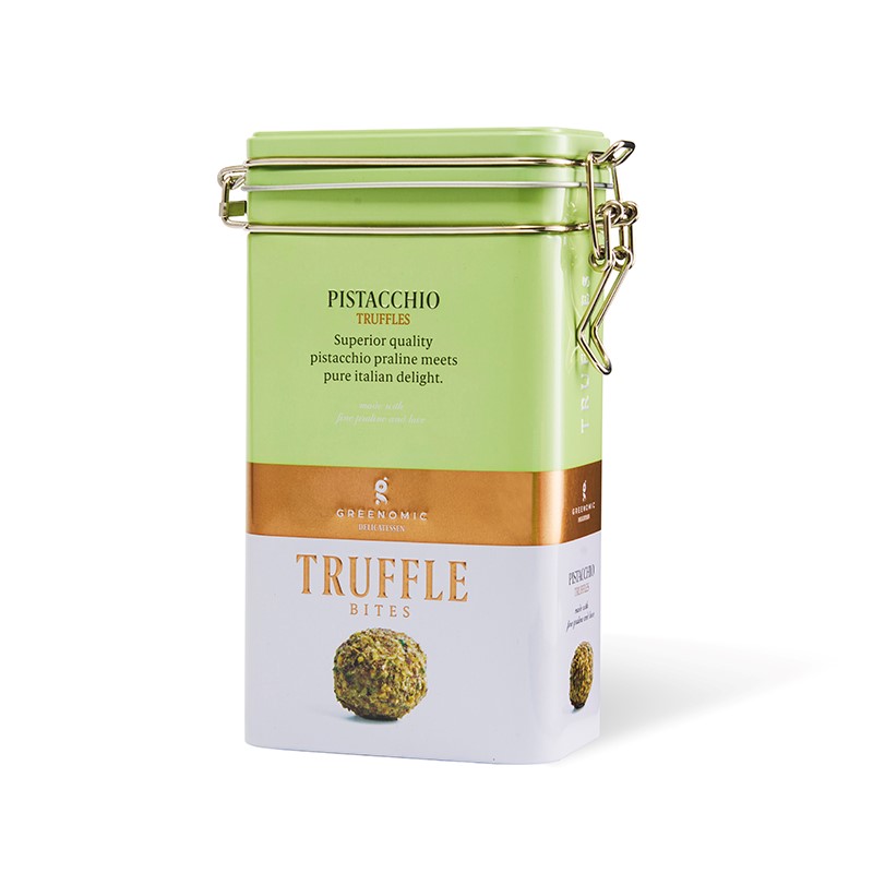 truffles-tin-pistacchio Greenomic Pistacchio Truffles – Edle Pistazientrüffel in exklusiver Design-Dose Luxuriöser Pistaziengenuss für anspruchsvolle Feinschmecker Die Greenomic Pistacchio Truffles vereinen feinste Confiserie-Kunst mit hochwertigsten Pistazien zu einem außergewöhnlichen Geschmackserlebnis. Eine cremige Pistazienfüllung trifft auf aromatische Pistazienpaste, edles Pistazienmehl und knackige Pistazienstücke. Das Ergebnis ist ein zartschmelzender Trüffel mit intensivem Pistaziengeschmack und einer unverwechselbaren Eleganz.